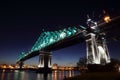 Montreal 375th anniversary. Jacques Cartier Bridge. Bridge panoramic colorful silhouette by night